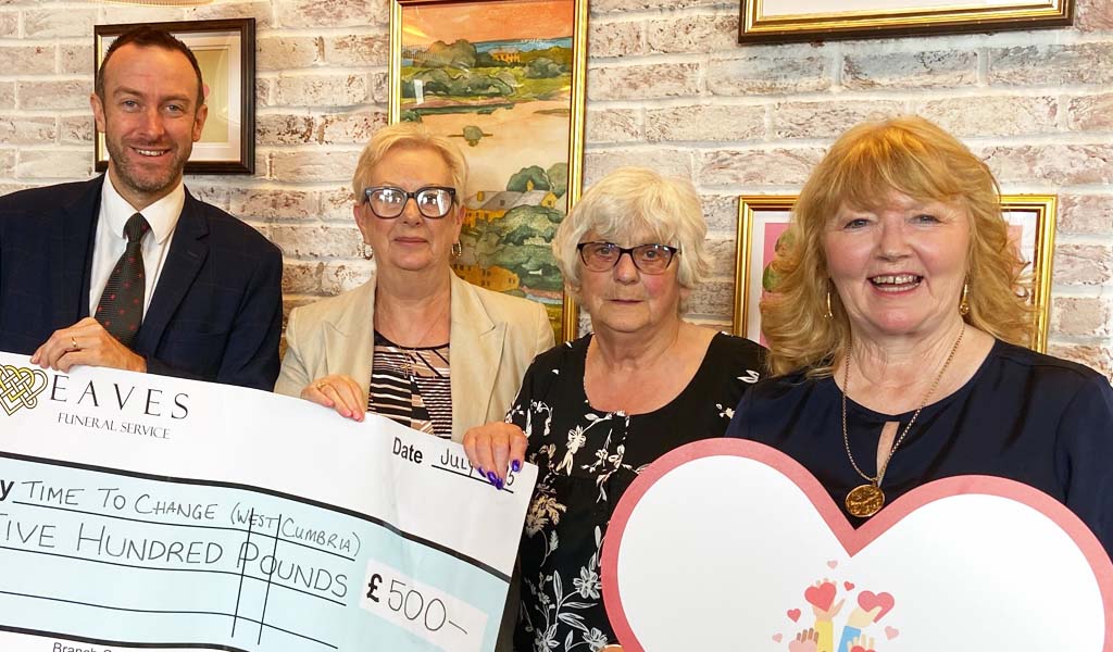 The Eaves Funeral Sevice Team raised £500 to Time to Change West Cumbria